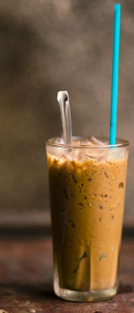Photo by frank mckenna glass of iced coffee